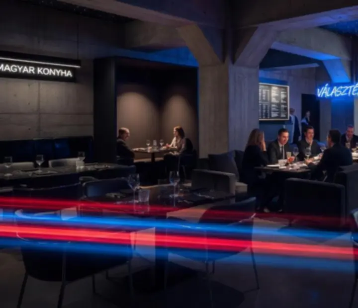 Cinematikus, sötét Budavera étterem kozmikus vörös-kék fényekkel és vendégekkel.